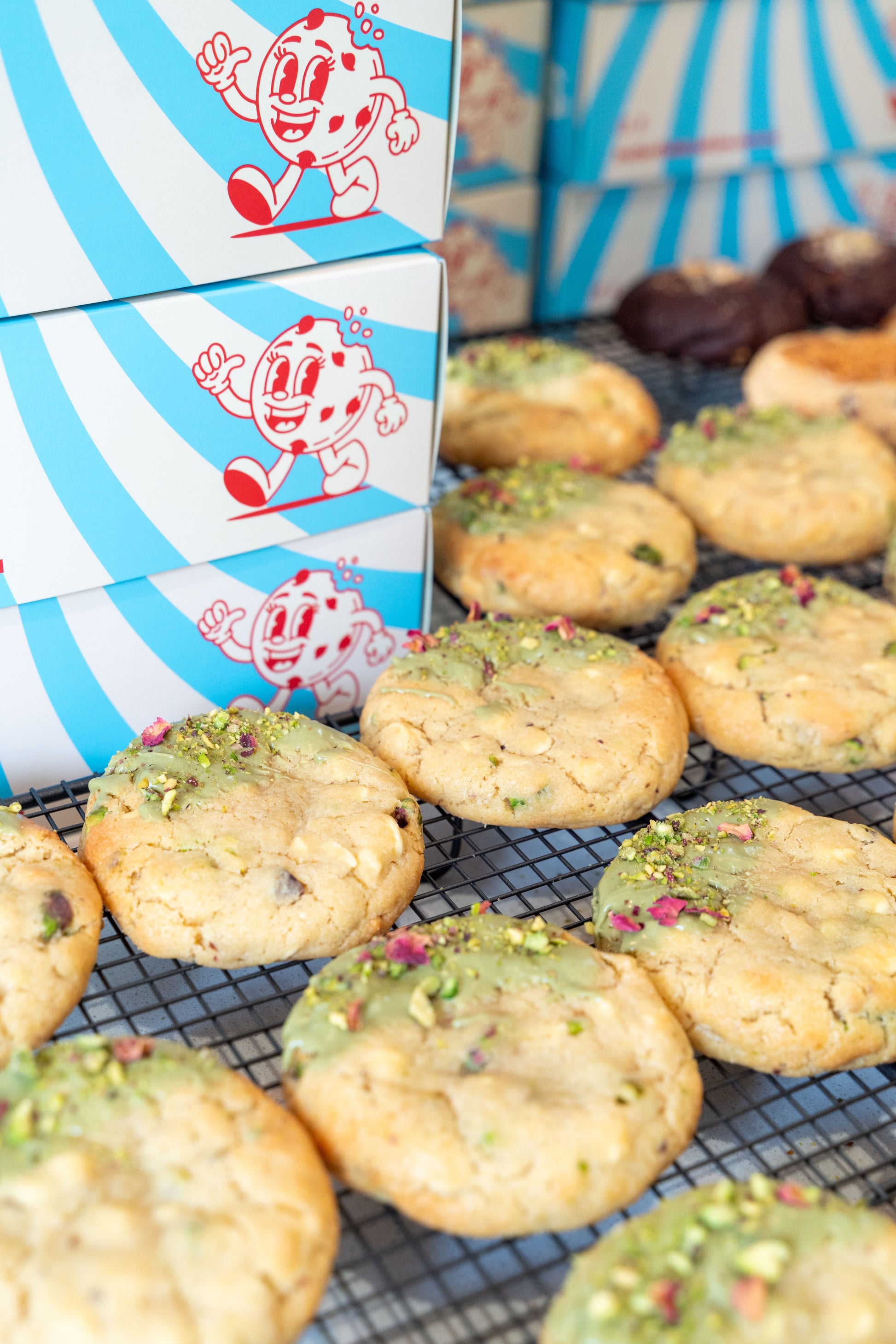 Close-up of a delicious Pistachio chunky cookie, freshly baked by Butterfield Cookies in Sydney.